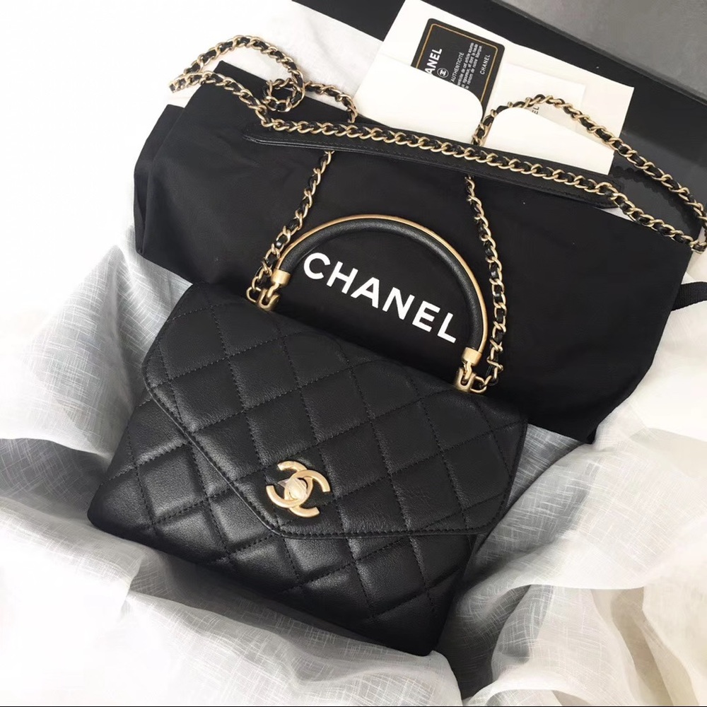 Chanel Flap bag with Top handle , calfskin.